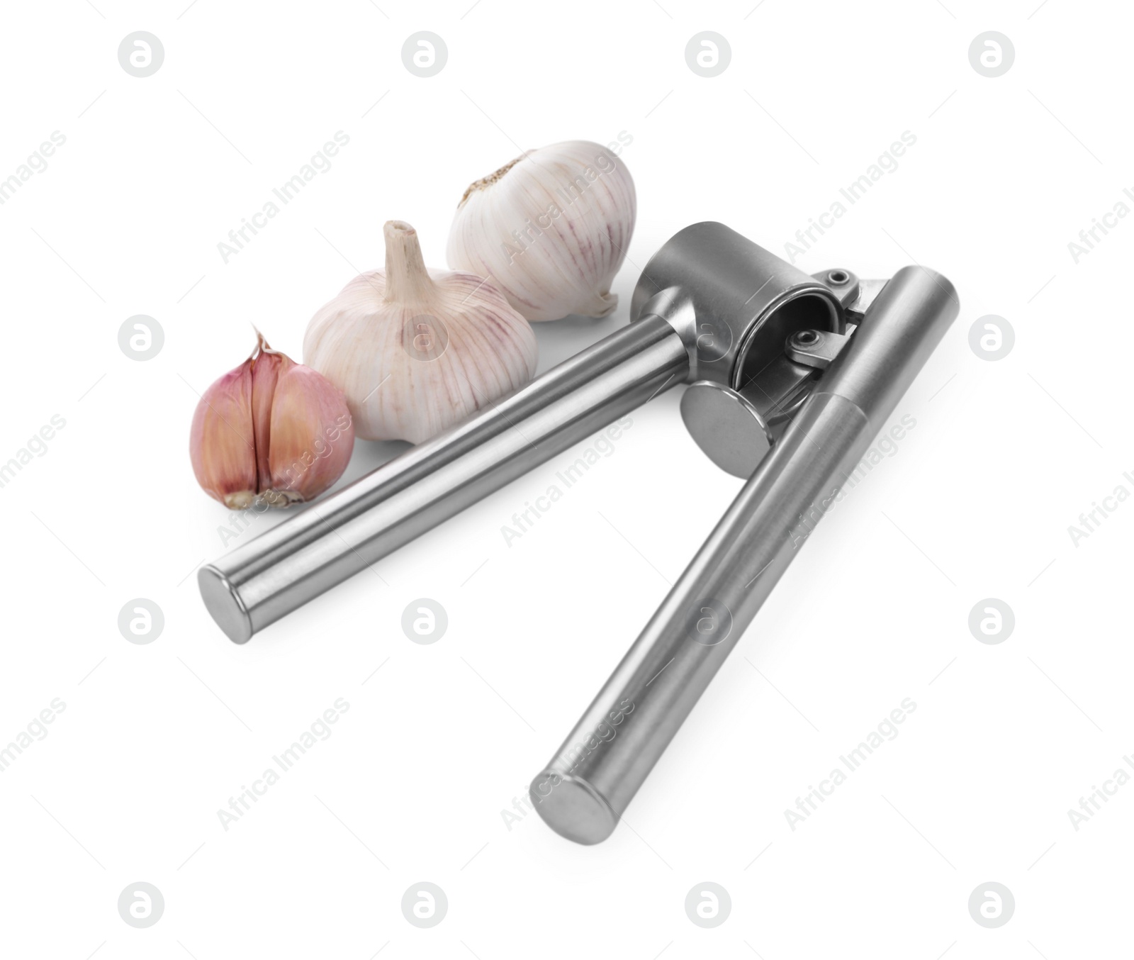 Photo of One metal press and garlic bulbs isolated on white