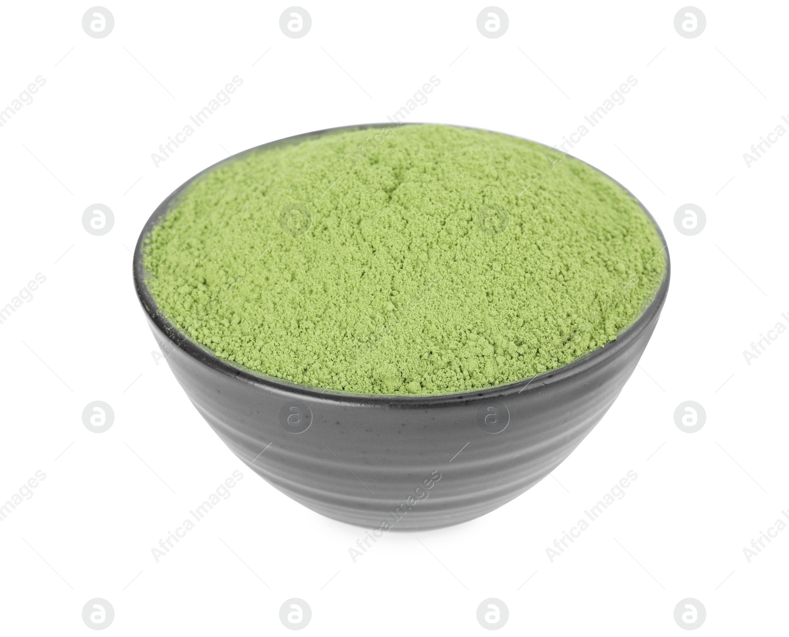 Photo of Bowl of matcha powder isolated on white