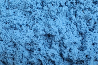 Photo of Blue kinetic sand as background, closeup view