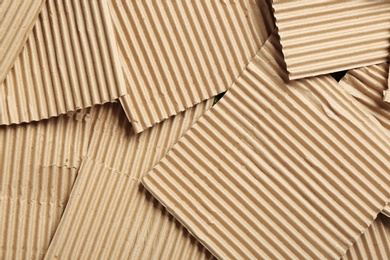 Pieces of cardboard as background, top view. Recycling concept