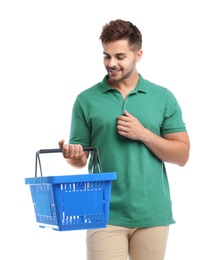 Young man with empty shopping basket isolated on white