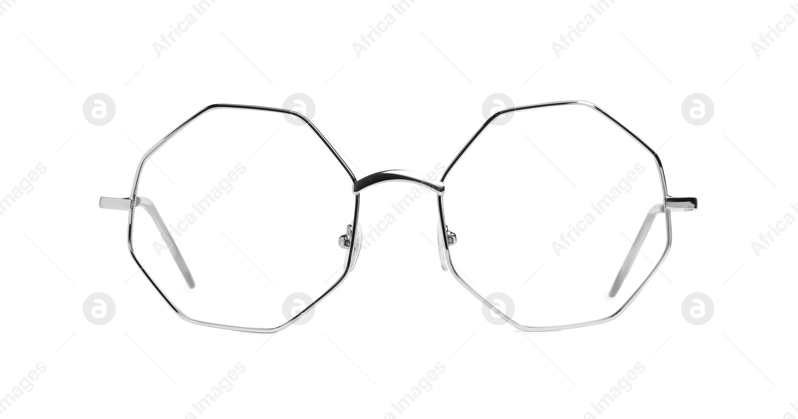 Photo of Stylish glasses with metal frame isolated on white