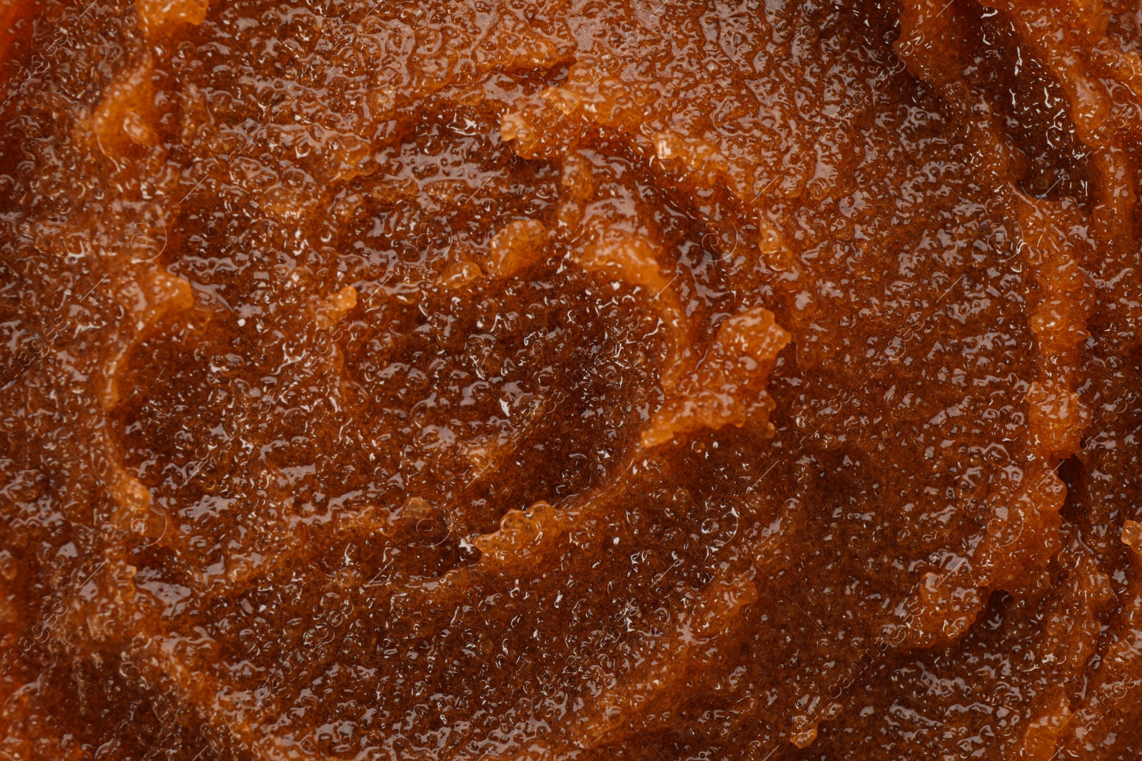 Photo of Body scrub as background, closeup. Cosmetic product