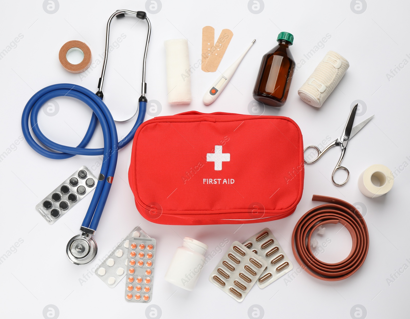 Photo of Flat lay composition with first aid kit on white background