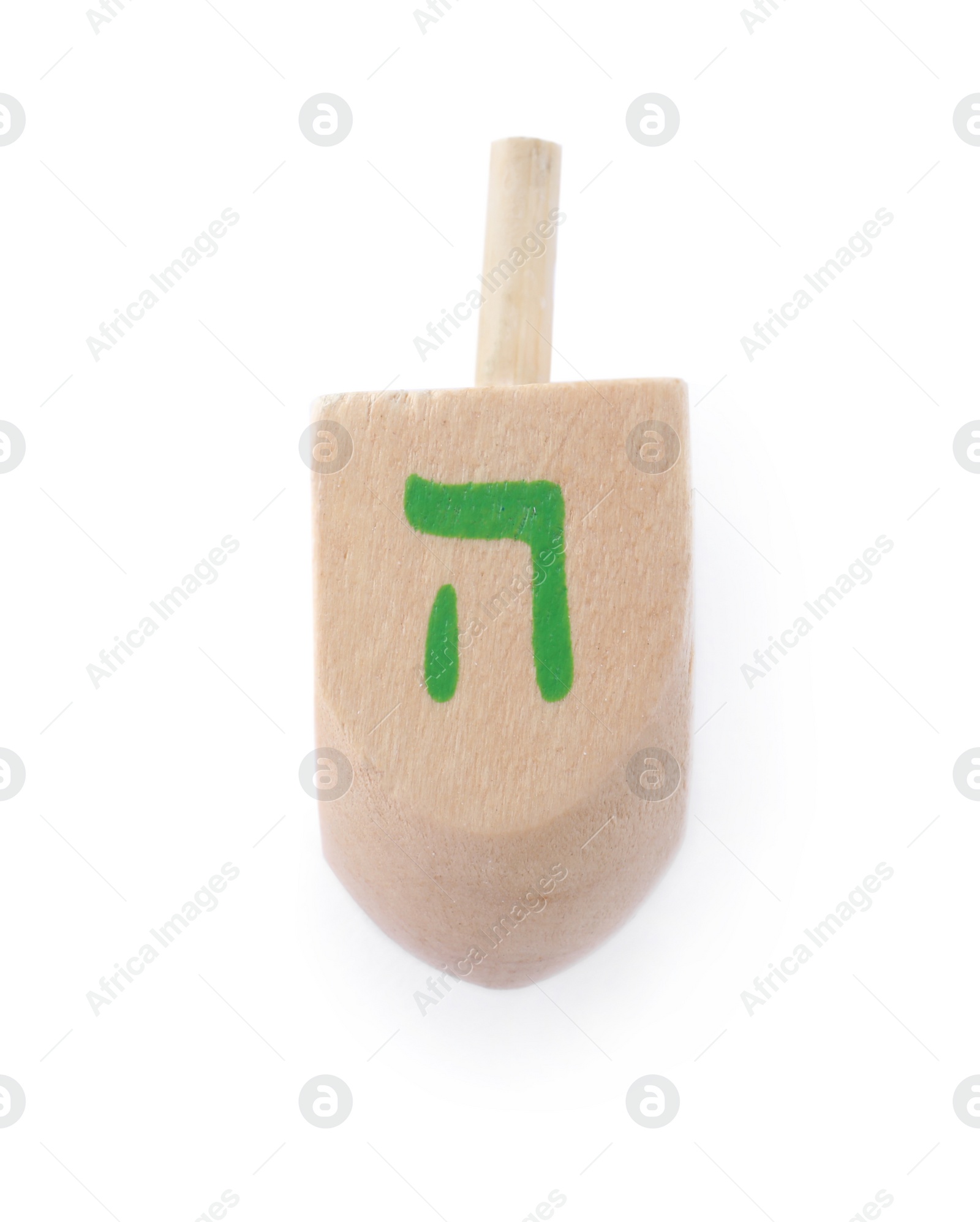 Photo of Wooden Hanukkah traditional dreidel with letter He isolated on white, top view