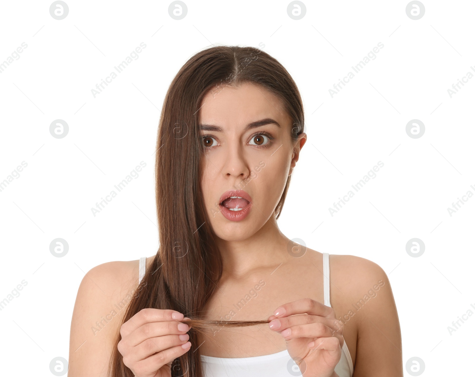 Photo of Emotional woman with damaged hair on white background