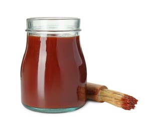 Photo of Brush with tasty barbecue sauce isolated on white