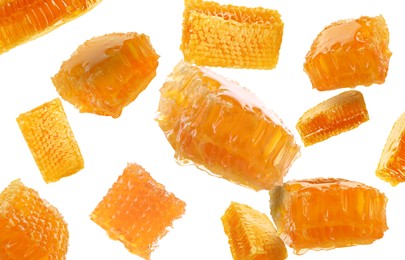 Image of Pieces of honeycomb falling on white background