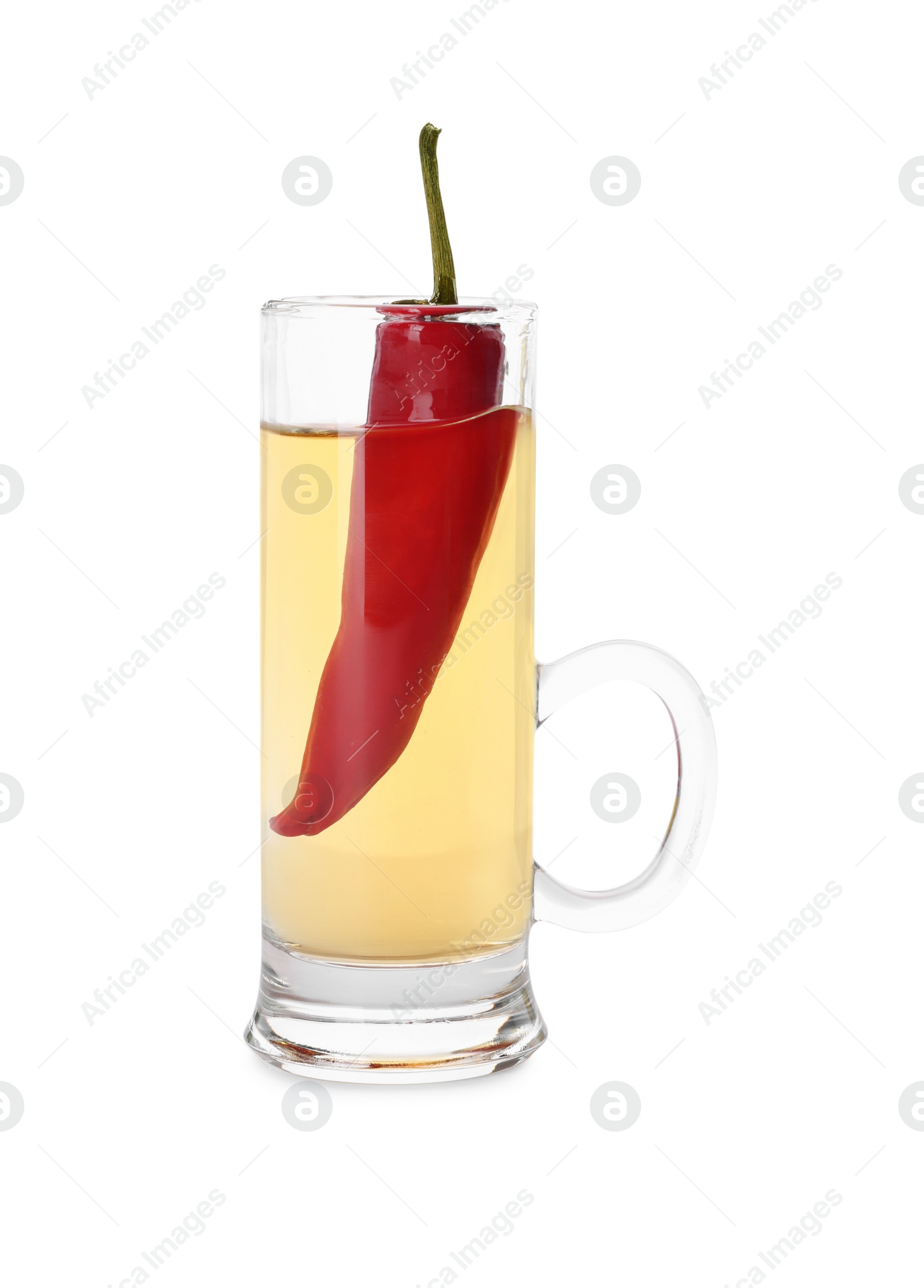 Photo of Red hot chili pepper and vodka in shot glass on white background