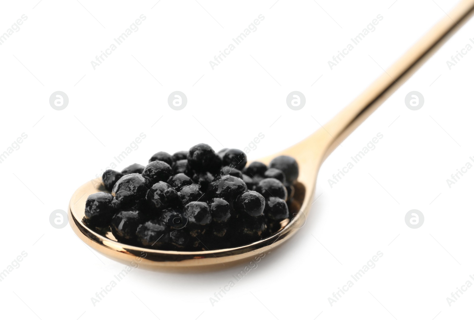 Photo of Metal spoon with black caviar on white background
