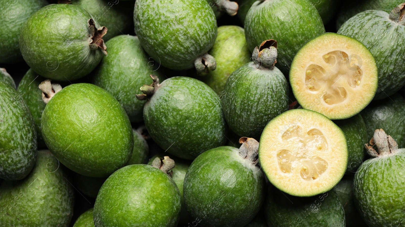 Image of Fresh green feijoa fruits as background, closeup. Banner design