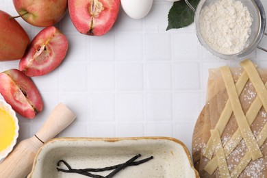 Photo of Making apple pie. Frame of different ingredients and cookware on white tiled table, flat lay. Space for text