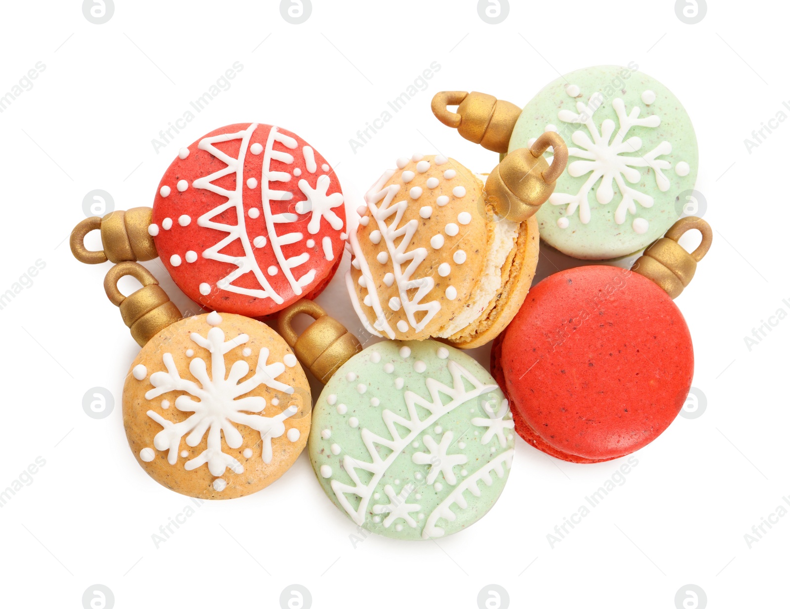 Photo of Beautifully decorated Christmas macarons on white background, top view