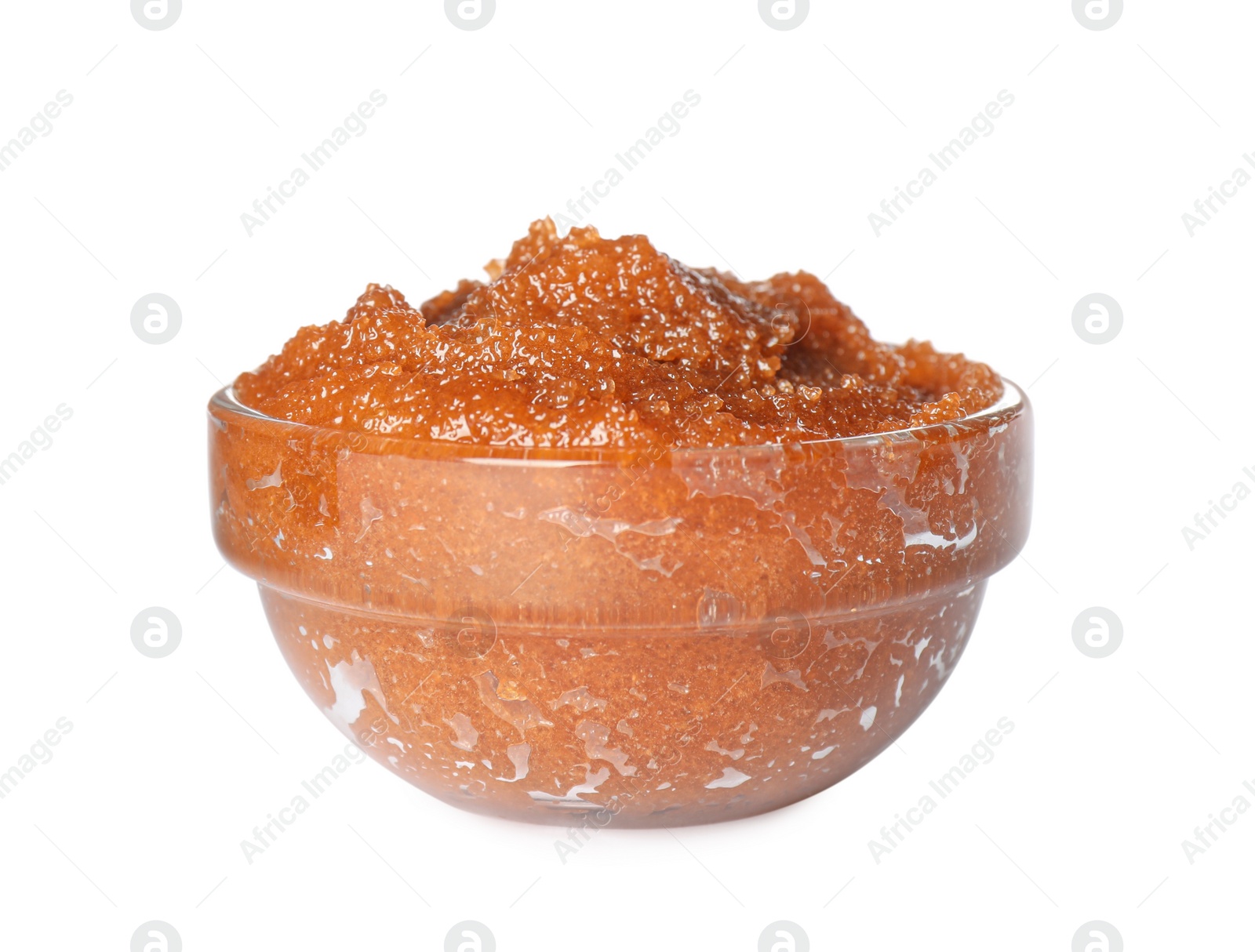 Photo of Glass bowl of brown body scrub isolated on white