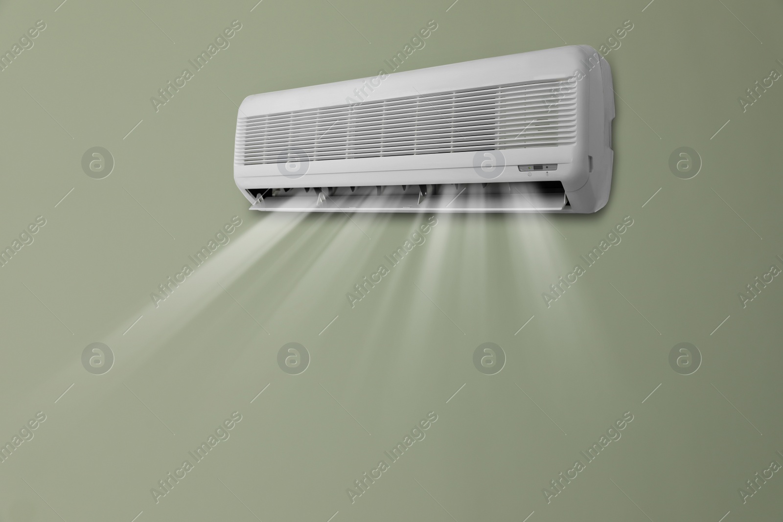 Image of Modern air conditioner on grey wall indoors