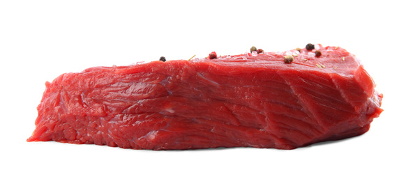 Fresh raw beef cut with spices isolated on white