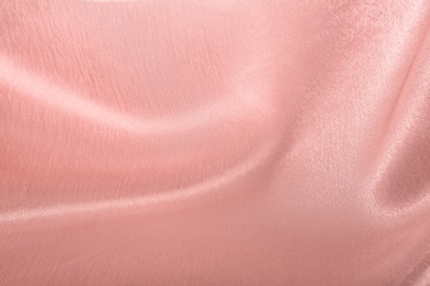 Photo of Texture of beautiful rose silk as background