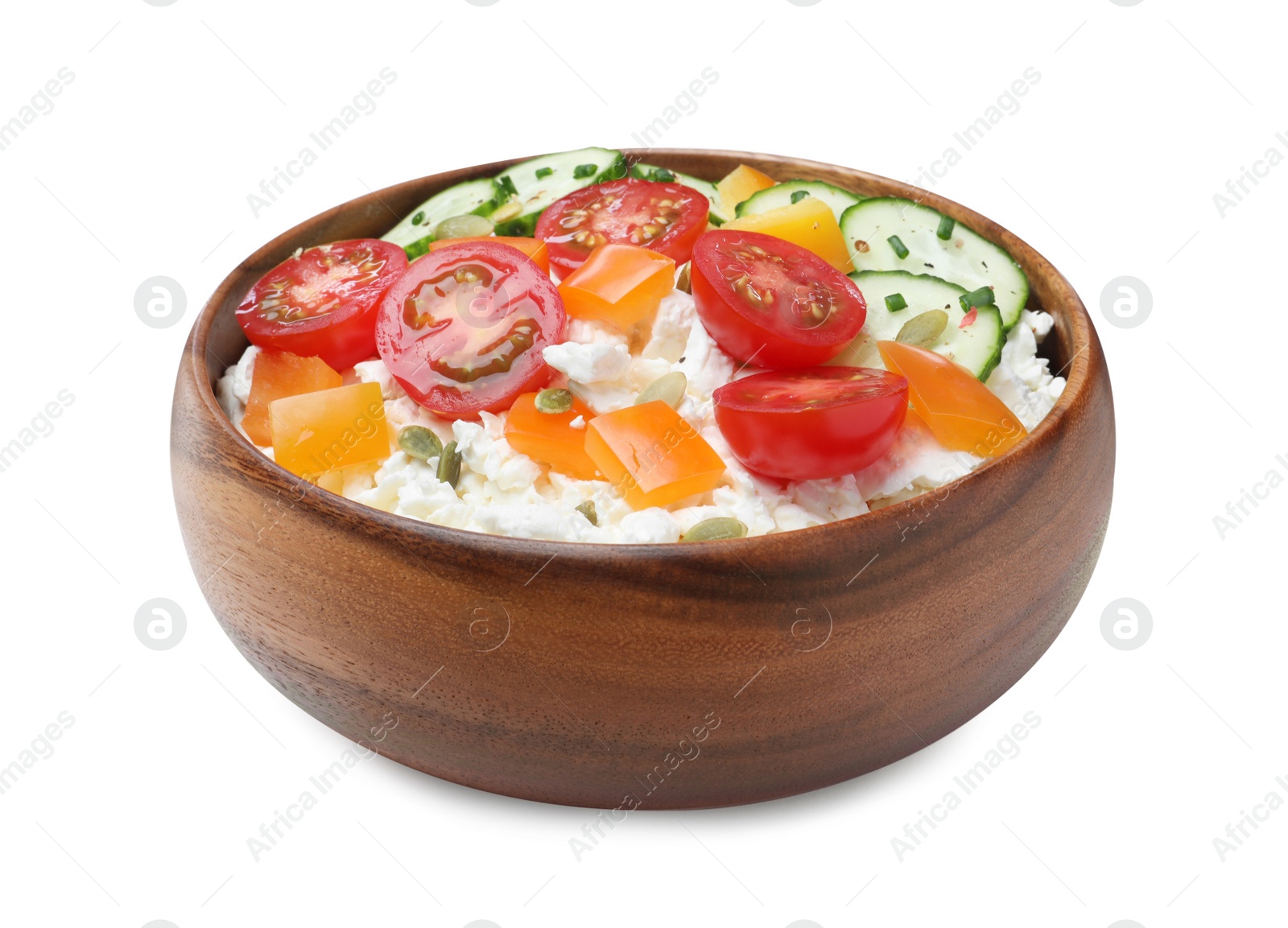 Photo of Fresh cottage cheese with vegetables in wooden bowl isolated on white
