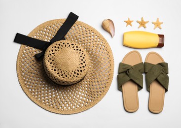 Photo of Flat lay composition with beach objects on white background