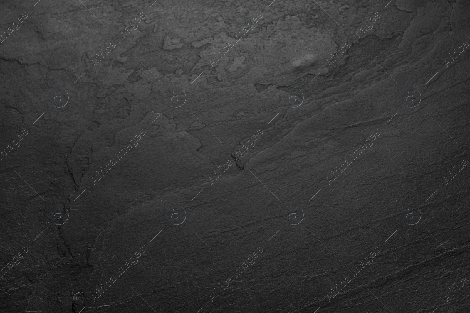 Image of Texture of black stone surface as background, closeup