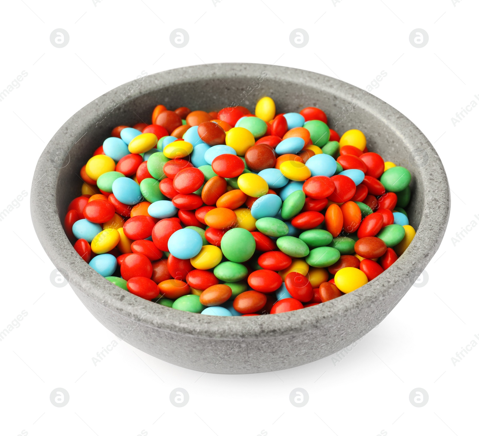 Photo of Bowl with colorful candies isolated on white