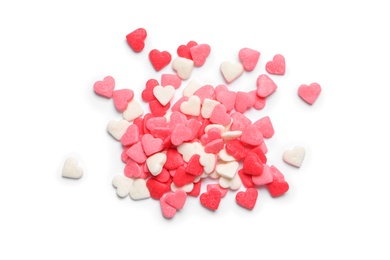 Pile of sweet candy hearts on white background, top view