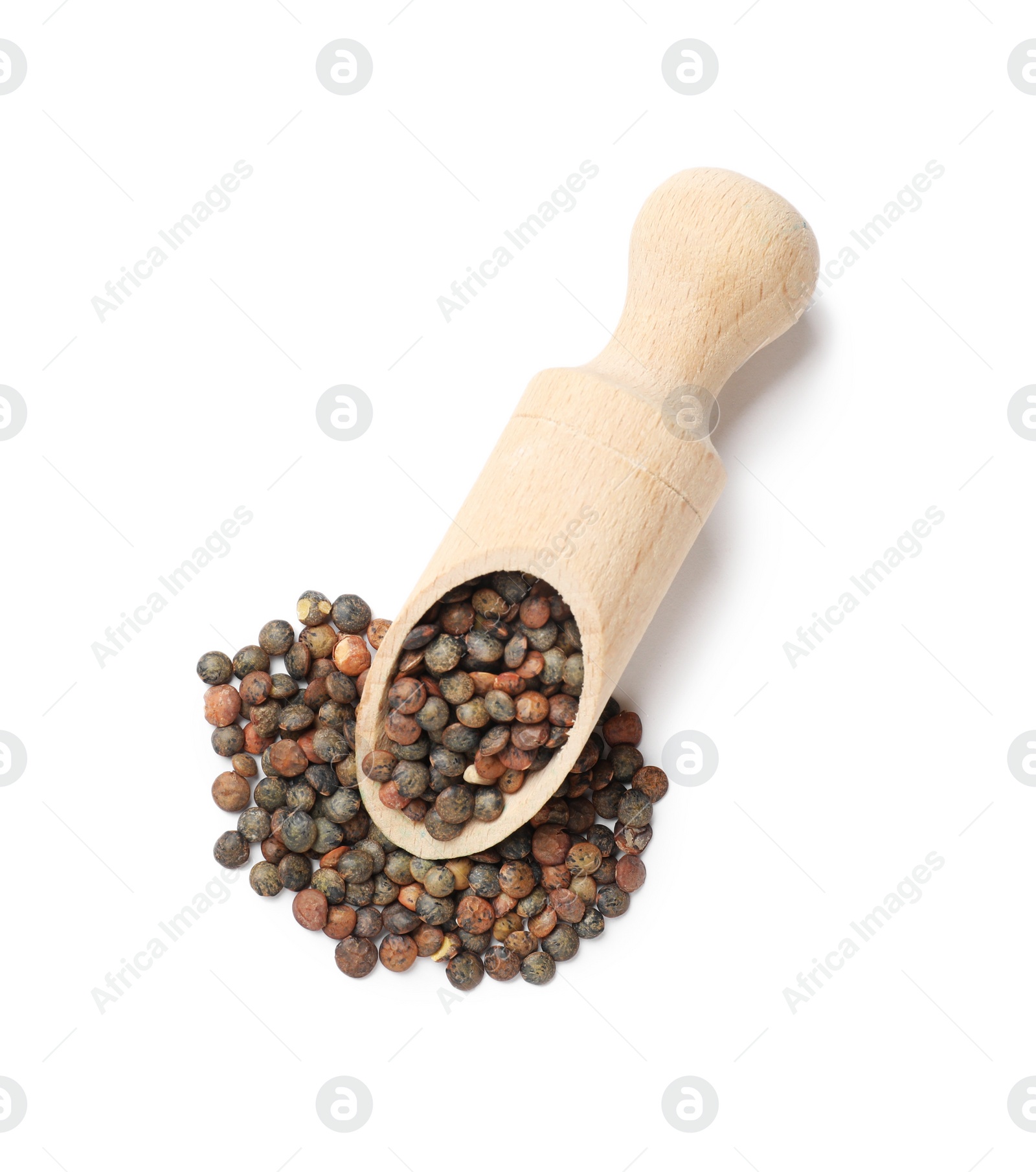 Photo of Wooden scoop with raw lentils isolated on white, top view