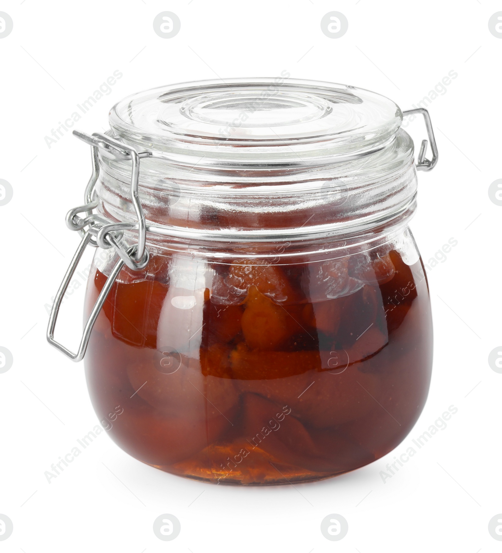 Photo of Quince jam in glass jar isolated on white
