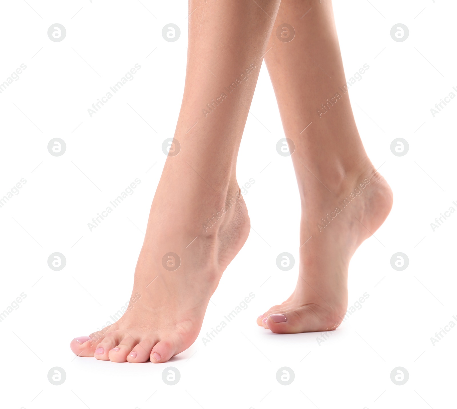 Photo of Woman with smooth feet on white background, closeup. Spa treatment