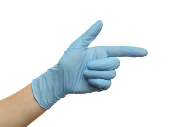 Doctor wearing light blue medical glove pointing at something on white background, closeup