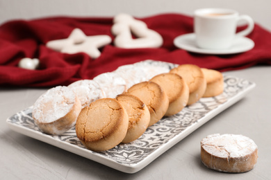 Photo of Tasty homemade cookies on light grey table