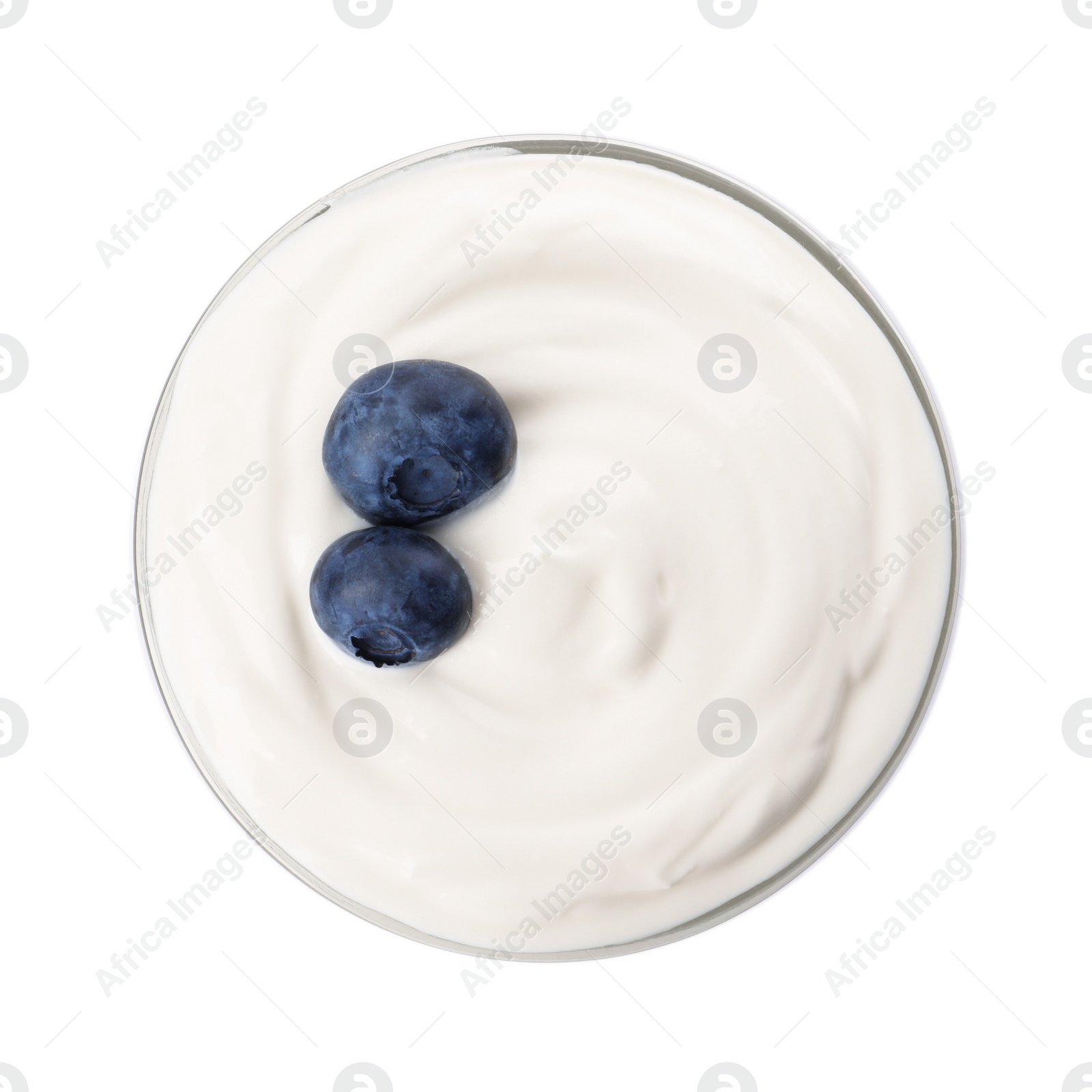 Photo of Bowl of delicious yogurt with blueberries isolated on white, top view