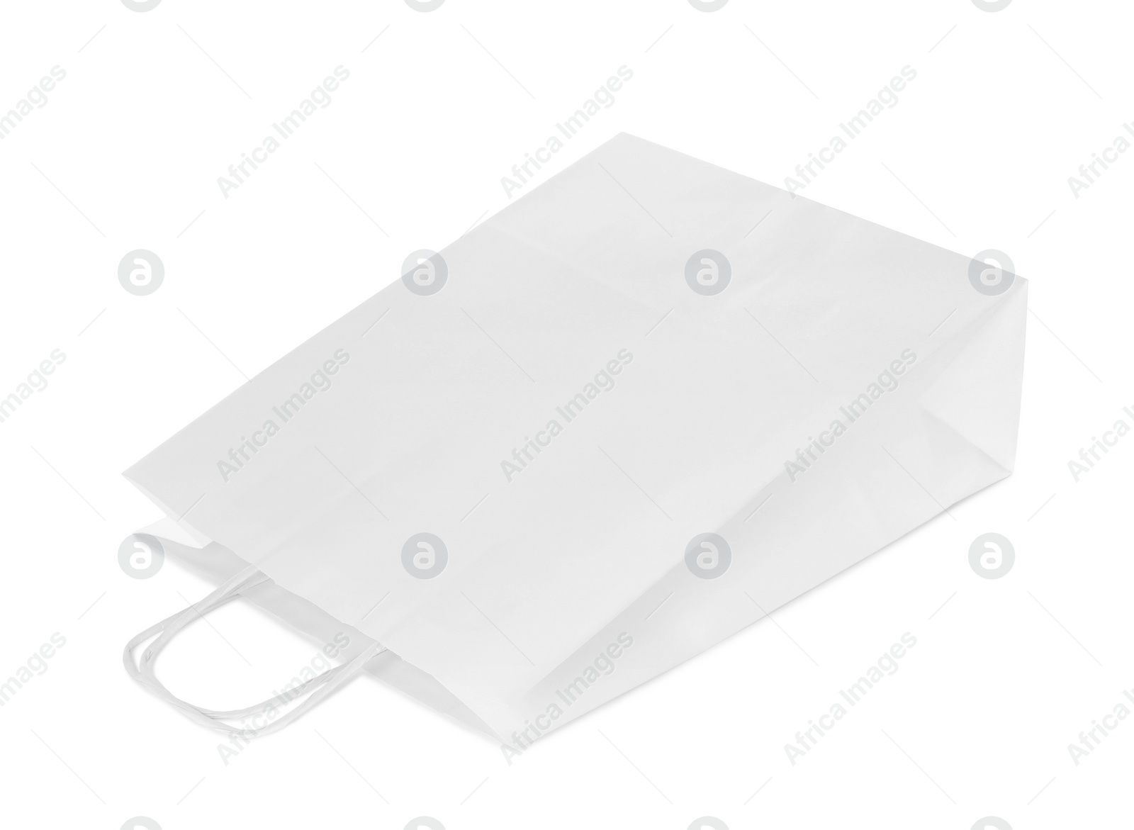 Photo of One paper shopping bag isolated on white