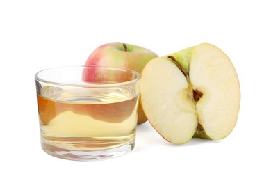 Apple vinegar in glass and fruits isolated on white