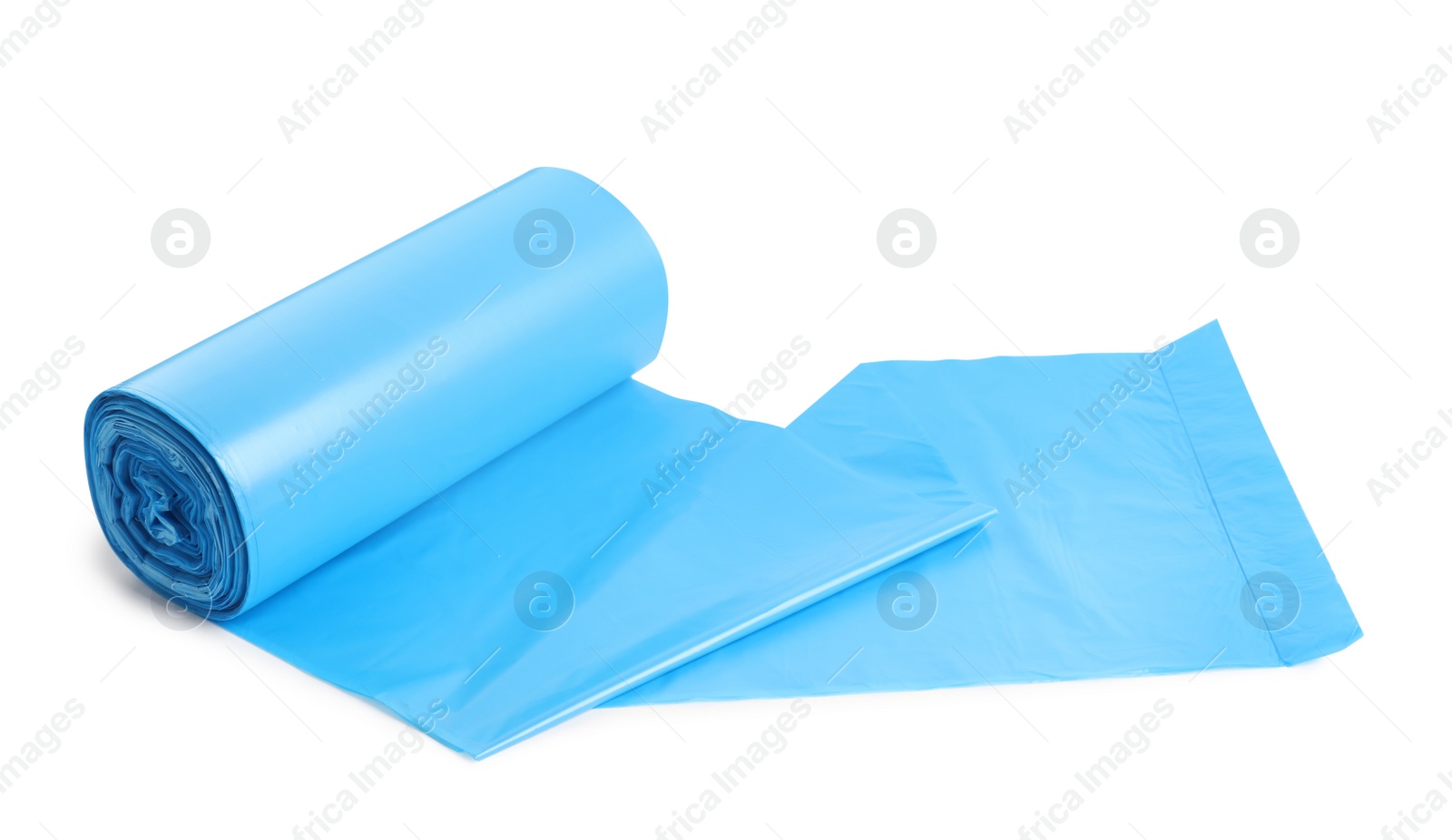 Photo of Roll of turquoise garbage bags on white background. Cleaning supplies