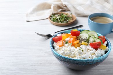 Photo of Delicious cottage cheese with vegetables and chia seeds served on white wooden table, space for text. Tasty breakfast