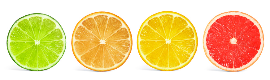 Image of Set of different citrus slices on white background, top view. Banner design