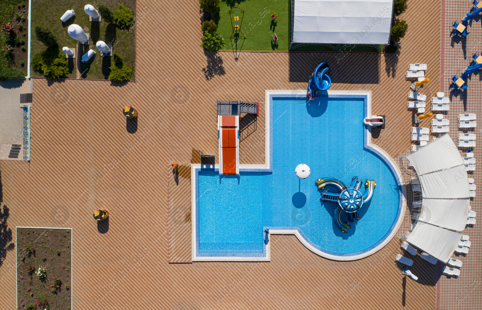 Image of Aerial view of swimming pool on sunny day