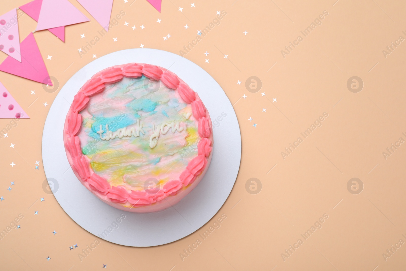 Photo of Cute bento cake with tasty cream and decor on beige background, flat lay. Space for text