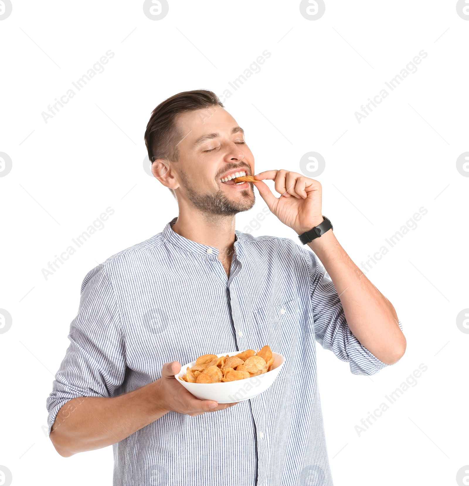 Photo of Man eating potato chips on white background