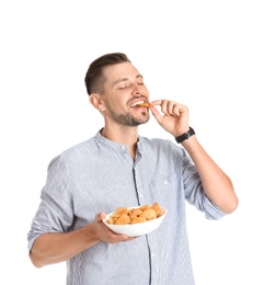 Photo of Man eating potato chips on white background