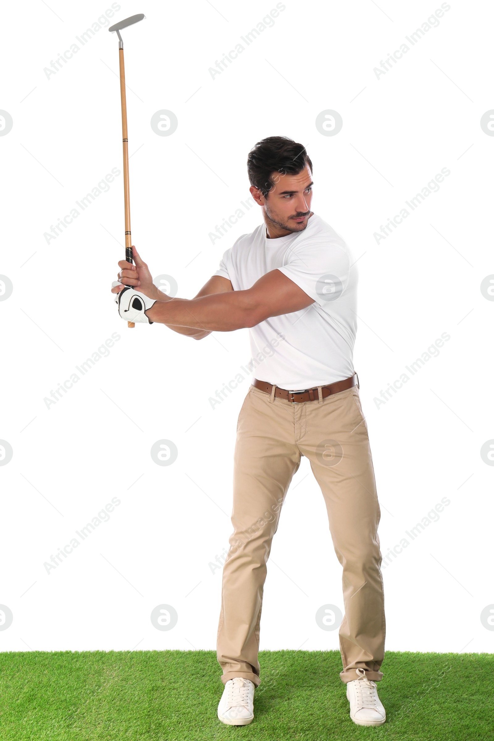 Photo of Young man playing golf on white background