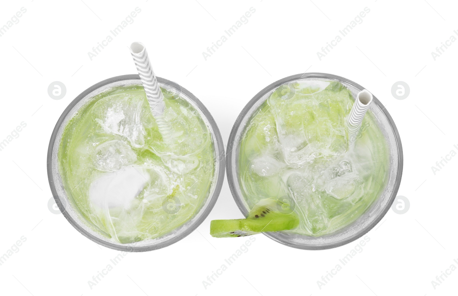 Photo of Glasses of refreshing drink with kiwi isolated on white, top view