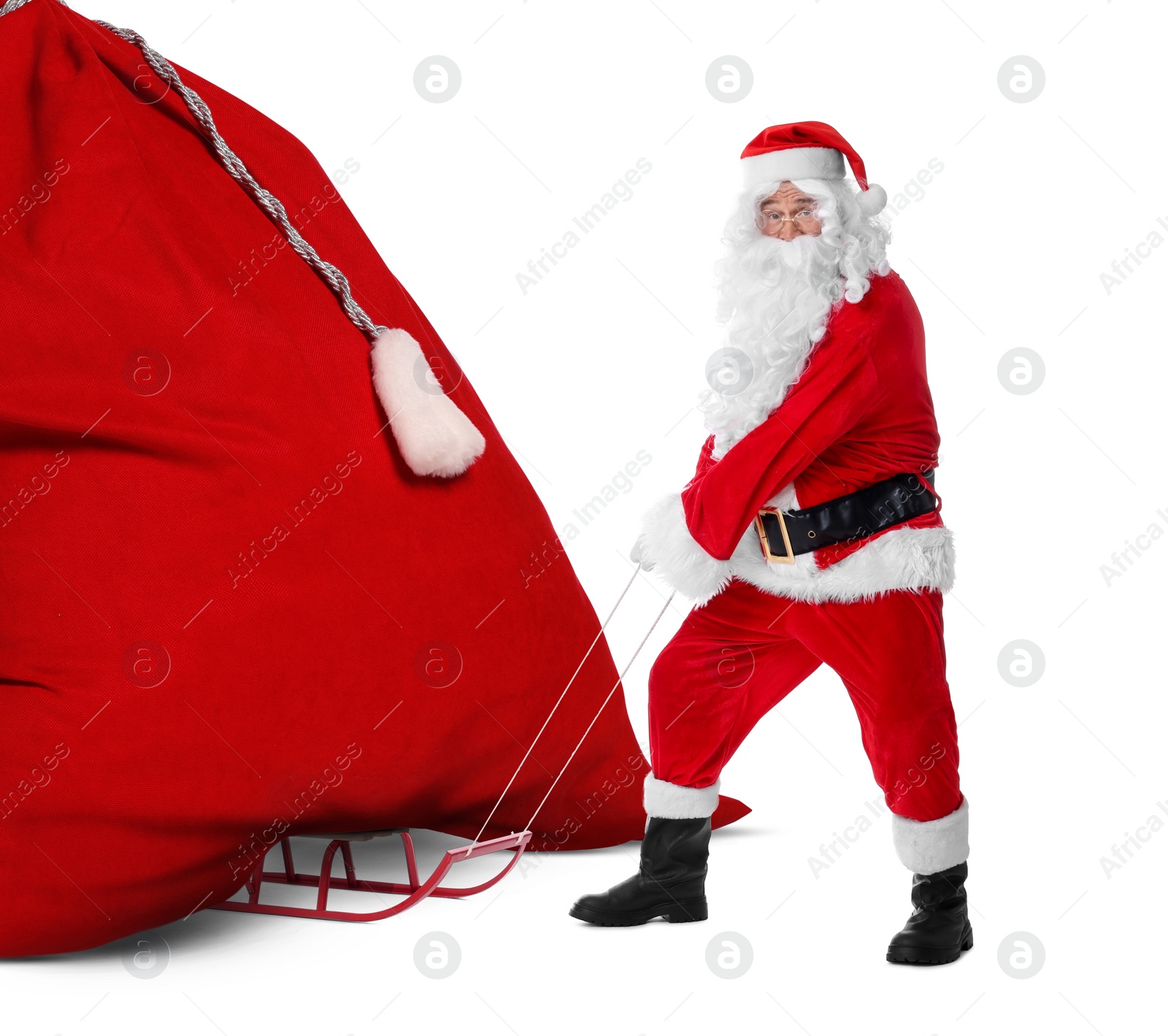 Image of Santa Claus with big red bag full of Christmas presents on sled against white background