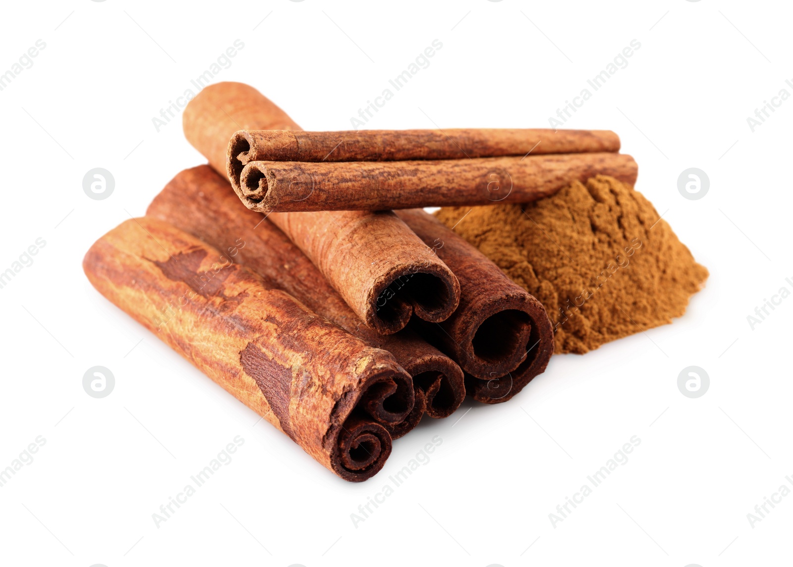 Photo of Dry aromatic cinnamon sticks and powder isolated on white