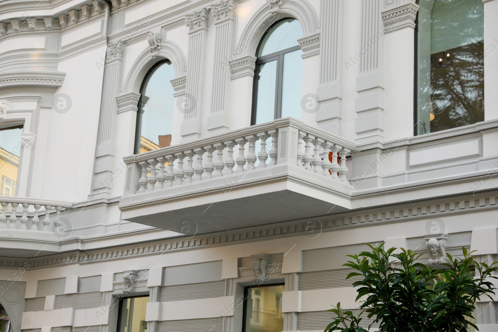 Photo of Exterior of beautiful building with balcony outdoors