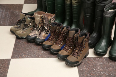 Footwear for fishing on floor in sports shop