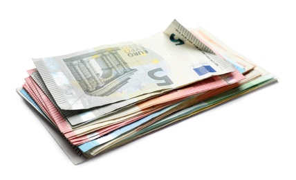 Image of Pile of different Euro banknotes on white background