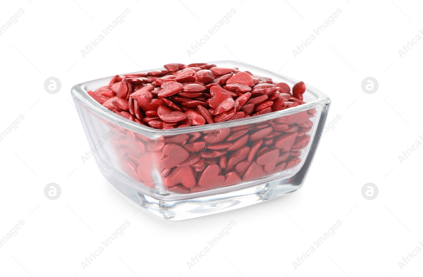 Photo of Bright heart shaped sprinkles in glass bowl isolated on white