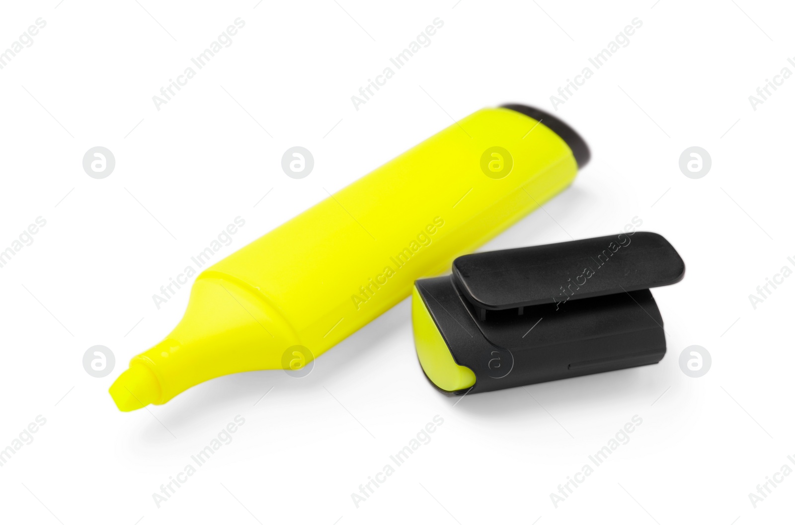 Photo of Bright yellow marker isolated on white. Office stationery